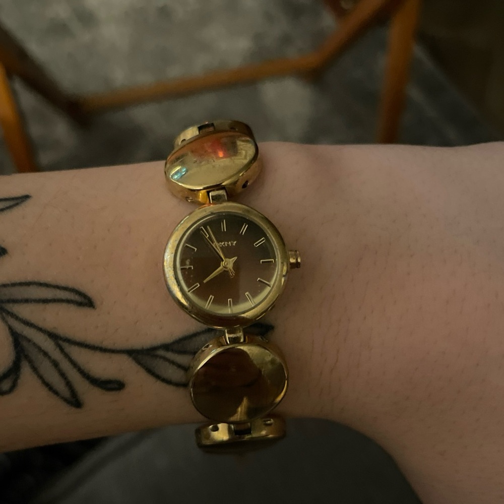 DKNY Gold Women's Watch with Unique Bracelet Design